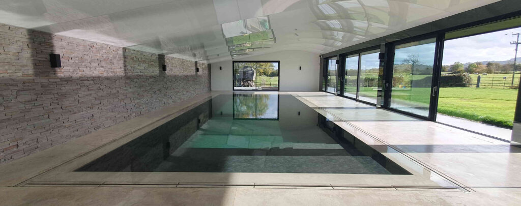 Indoor deck level swimming pool design